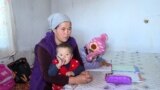 Kyrgyzstan - mother Zhazgul Raimbek kyzy, whose family of eight lives in a rickety house just meters from a landfill in the Kyrgyz capital, Bishkek. screen grab