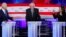Miami, Florida, U.S - Former Vice President Joe Biden and Senator Kamala Harris / Former Vice President Joe Biden and Senator Kamala Harris debate racial issues as Senator Bernie Sanders listens during the second night of the first U.S. Democratic preside