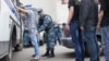 Russia -- Police raid at a Moscow market, July 30, 2013