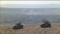 Боевики "Исламского государства" продолжают в Сирии наступление на город Кобани, расположенный на границе с Турцией