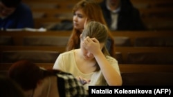 Journalism students attend a lecture at Moscow State University.