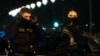 Police officers stand guard at the scene of a stabbing in Paris on December 2, 2023.