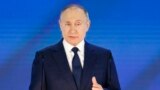 Russia Putin -- Russian President Vladimir Putin gives his annual state of the nation address in Manezh, Moscow, Russia, Wednesday, April 21, 2021. Russian President Vladimir Putin is delivering his annual address to the nation amid a sweeping Kremlin cra