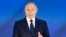 Russia Putin -- Russian President Vladimir Putin gives his annual state of the nation address in Manezh, Moscow, Russia, Wednesday, April 21, 2021. Russian President Vladimir Putin is delivering his annual address to the nation amid a sweeping Kremlin cra