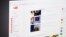 Homepage of website "YouTube" photographed on computer screen
