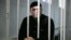 CHECHNYA -- Oyub Titiyev, the head of regional branch of Russian human rights group Memorial, attends a court hearing in Shali, November 26, 2018
