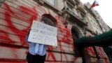 USA – A protestor stands outside of the building of the Consulate General of the Russian Federation after it was vandalized with red paint in Manhattan, New York City, U.S., September 30, 2022