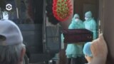 Removal of a coffin from an Almaty morgue on July 8, 2020