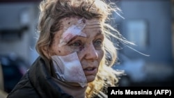 Пострадавшая во время обстрелов города Чугуев на востоке Украины