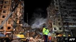 Последствия ракетного удара по многоэтажке в Днепре, где погибли более 40 человек