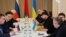 Members of delegations from Ukraine and Russia, including Russian presidential aide Vladimir Medinsky (2L), Ukrainian presidential aide Mykhailo Podolyak (2R), Volodymyr Zelensky's "Servant of the People" lawmaker Davyd Arakhamia (3R), hold talks in Belar