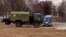 Военные машины скорой помощи у госпиталя в Мозыре, Беларусь