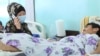 "Ему очень больно". Настоящее Время навестило в больнице кыргызстанца, которому сломали ребра и обе ноги в полиции Алматы 
