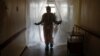 UKRAINE -- A doctor walks along a corridor while entering a hospital for patients infected with the coronavirus disease (COVID-19) in Kyiv, November 25, 2020