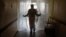 UKRAINE -- A doctor walks along a corridor while entering a hospital for patients infected with the coronavirus disease (COVID-19) in Kyiv, November 25, 2020