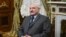 Belarus' President Alexander Lukashenko looks on as Russia's President Vladimir Putin 