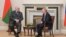 Belarus' President Alexander Lukashenko (L) and Russia's President Vladimir Putin