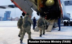 Russian airborne troops depart for Kazakhstan on January 6, 2022 as part of the Collective Security Treaty Organization peacekeeping force.