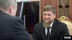 Глава Чечни Рамзан Кадыров во время встречи с Владимиром Путиным