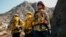 U.S. -- Firefighters battle the Woolsey Fire as it continues to burn in Malibu, California, U.S., November 11, 2018