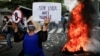 Протестующие жгут банкомат, президент меняет Конституцию. Как живет Сальвадор через три недели после легализации биткоина