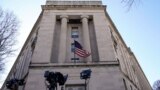 Washington, U.S. - Department of Justice / Television cameras stand in front of the Department of Justice the day after Special Counsel Robert Mueller delivered his report into Russia's role in the 2016 U.S. election and any potential wrongdoing by Presid