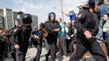 RUSSIA – Policemen detain an opposition supporter
