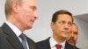 Михаил Мень (на заднем плане) с президентом России Владимиром Путиным и вице-премьером Александром Жуковым
