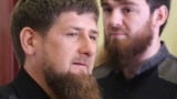 Ramzan Kadyrov (front) during a meeting between the newly appointed presidential envoy to Russia's North Caucasus Federal District and local government official
