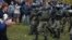 Belarus - Belarusian law enforcement officers block opposition supporters during their rally to reject the presidential election results in Minsk, 1nov2020