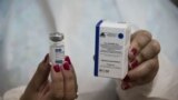 A health worker shows a vial of the Sputnik V vaccine in Argentina, on December 29, 2020.