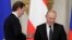 RUSSIA -- Austrian Chancellor Sebastian Kurz gestures next to Russian President Vladimir Putin at the State Hermitage Museum in St. Petersburg, October 3, 2018