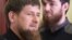 Ramzan Kadyrov (front) during a meeting between the newly appointed presidential envoy to Russia's North Caucasus Federal District and local government official