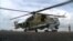 Российский военный вертолет на базе в Латакии, Сирия