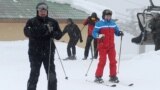 RUSSIA -- Russian President Vladimir Putin and his Belarusian counterpart Alyaksandr Lukashenka ski following their talks in Sochi, February 22, 2021