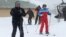 RUSSIA -- Russian President Vladimir Putin and his Belarusian counterpart Alyaksandr Lukashenka ski following their talks in Sochi, February 22, 2021