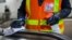New York, U.S. - An MTA worker disinfects a subway station in the Manhattan borough of New York City