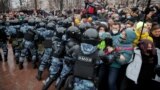 RUSSIA – Law enforcement officers push people during a rally in support of jailed Russian opposition leader Alexei Navalny in Moscow, Russia January 23, 2021