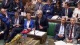 A video grab from footage broadcast by the UK Parliament's Parliamentary Recording Unit (PRU) shows Britain's Prime Minister Theresa May as she speaks in the House of Commons in London on January 15, 2019.