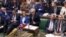 A video grab from footage broadcast by the UK Parliament's Parliamentary Recording Unit (PRU) shows Britain's Prime Minister Theresa May as she speaks in the House of Commons in London on January 15, 2019.