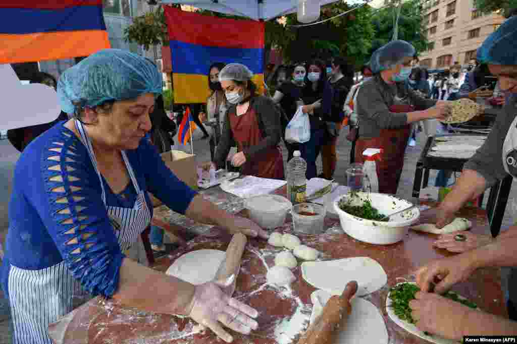 In Yerevan, refugees from Nagorno-Karabakh sell herb-stuffed flatbreads, a regional specialty, to raise money to send back home. The number of Karabakhi refugees now in Armenia remains unclear.&nbsp;