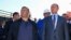 CRIMEA -- Russian President Vladimir Putin (R) flanked by businessman and billionaire Arkady Rotenberg, visit the construction site of the Kerch Strait bridge in Kerch, September 15, 2016