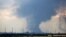 UKRAINE – Smoke billows over the oil refinery outside the town of Lysychansk on June 23, 2022