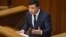 UKRAINE -- Ukrainian President Volodymyr Zelenskiy delivers a speech during a parliamentary session in Kyiv, March 4, 2020