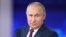 RUSSIA -- Russian President Vladimir Putin speaks during his annual nationwide televised phone-in show in Moscow, June 30, 2021