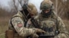 Военнослужащие ВСУ с планшетом, где установлена Delta system