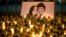 SLOVAKIA -- Light tributes placed during a silent protest in memory of murdered journalist Jan Kuciak and his girlfriend Martina Kusnirova, seen in photo, in Bratislava, Slovakia, on Wednesday, Feb. 28, 2018. 