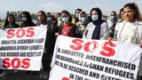 KYRGYZSTAN -- Afghan refugees protest in front of the U.S. embassy in Bishkek, August 19, 2021