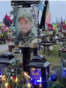 "На Рождество он всегда был дома". Близкие погибших украинских военных в праздник навещают их могилы на кладбище во Львове 