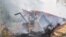 Ukraine -- Firefighters extinguish a fire at a gas station in Zaporizhzhia after a Russian strike, 25 June 2026